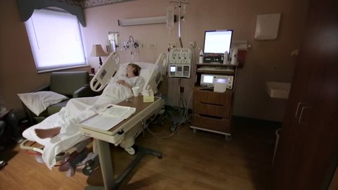 Pregnant Woman in Hospital Bed