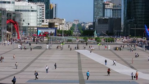 La Defense place with walking people from above, Paris