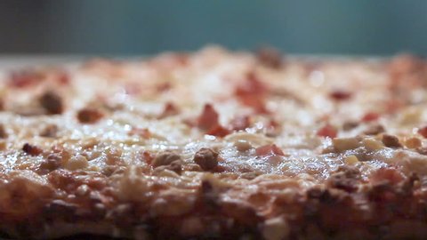 It's Pizza Night.  Pizza - cutting and serving. HD with shallow depth of field.  Edited with a community or church event for teens in mind.   Copy space available. Stock Video