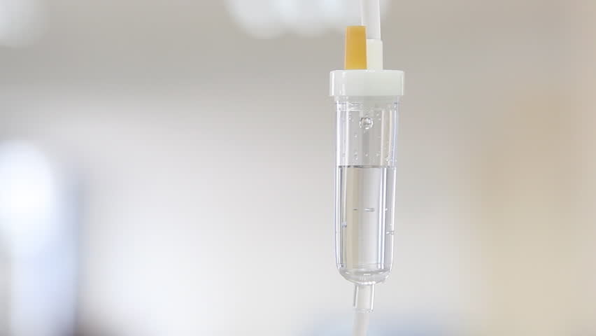 Intravenous drip on white background in operation room | Shutterstock HD Video #969727
