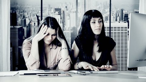Women in office feeling tired getting headache