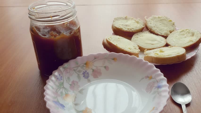 Natural delicious breakfast. Putting some oatmeal in a bowl 