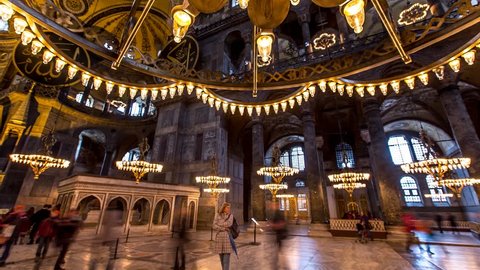 ISTANBUL - APRIL 06: Time Lapse scene of the interior in famous Hagia Sophia museum in 4K. Panning Tilt Shot. April 06, 2015 in Istanbul, Turkey. 
