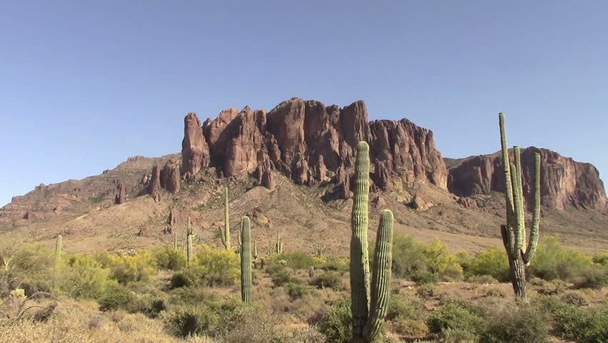 Zoom in, Superstition Mountains located in Lost Dutchman State Park, Arizona. The park is famous for the legend of a gold mine  in the park found by a German immigrant named Jacob Waltz back in 1891.