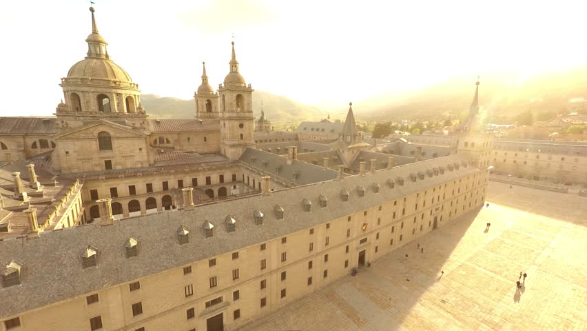 The Royal Seat of San Lorenzo de El Escorial, historical residence of the King of Spain, about 45 kilometers northwest Madrid, in Spain. Amazing aerial view from the top with a wide angle
