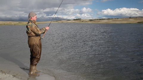 Fishing sequence. Dayan Nuur lake (Dayan) in Mongolian Altai Stock Video