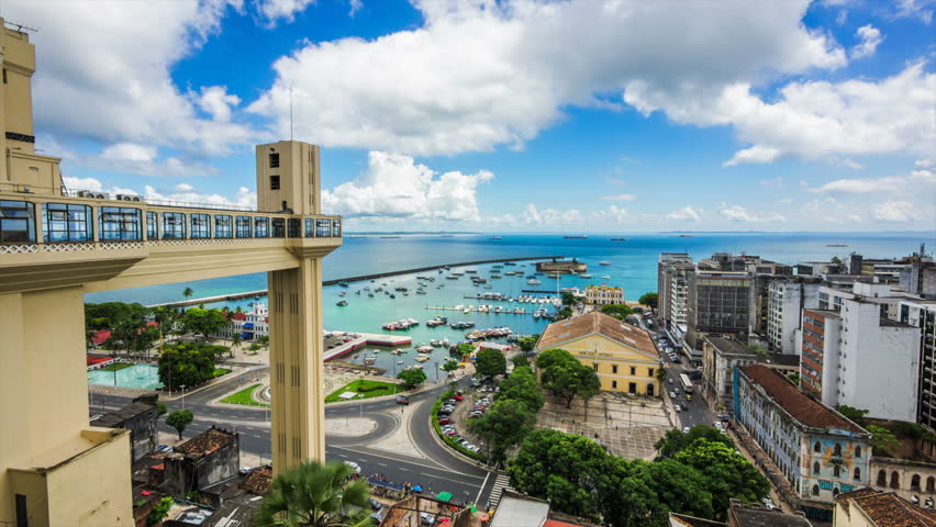 Salvador da Bahia, Brazil, time lapse view of Lacerda Elevator and All Saints Bay (Baia de Todos os Santos) on a beautiful summer day. Royalty-Free Stock Footage #9727475