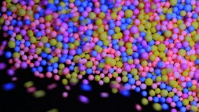 Bouncing colored rubber balls.