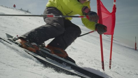 SLOW MOTION: Professional Skier at Giant Slalom Ski training