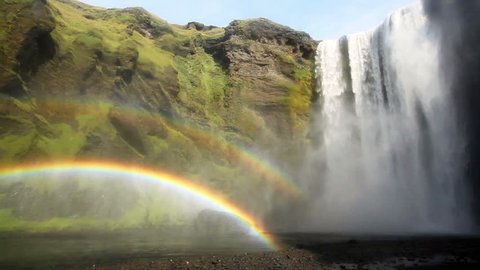 Famous and photography friendly waterfall in the southern part of Iceland, just south of Eyjafjallajokull. Extraordinary spectacle, Skogafoss with a double rainbow
