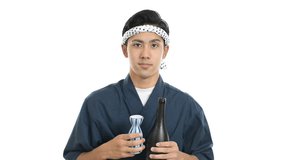Japanese chef holding bottle on white background