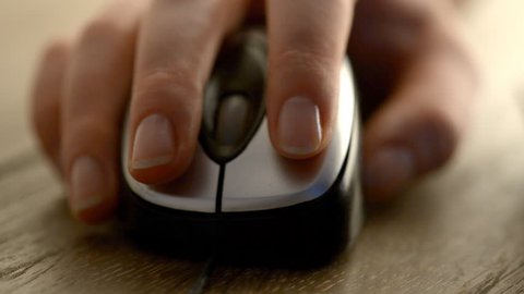 Woman click on Computer mouse