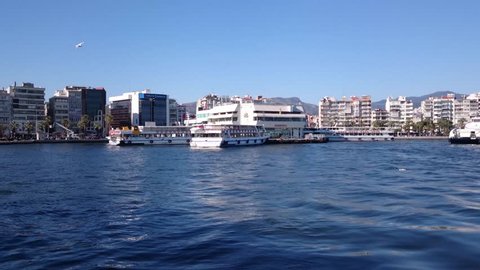 IZMIR - MARCH 1ST, 2015: Ferry Sails from Karsiyaka Ferry Station to Carry Passengers to City Center of Izmir.