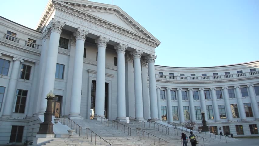 Citizens walk up the steps of Denver