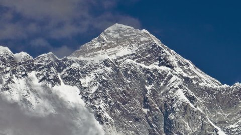 Time-lapse of clouds swirling around the summit of Mount Everest. The peak on the right is perhaps Lhotse. Cropped.