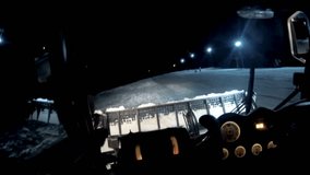 4K Ratrak drive POV, grooming machine, special snow vehicle ski slope preparation at night. UHD stock video