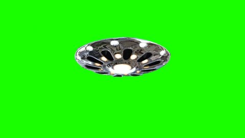 UFO - Flying Saucer - flying in and out - isolated on green screen