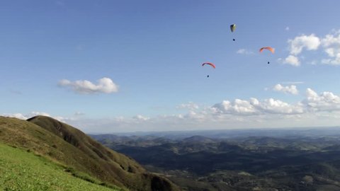 Paraglider flight in Lovely Day/Gliding is an extreme sport that does not use power equipment planar with wind and thermal layers aid, thus enabling the realization of local flights or long distances.
