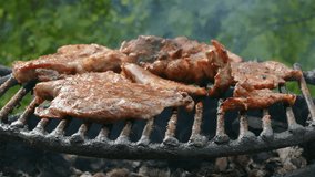 Barbecue, preparing meat on classical way using charcoal, closeup and selective focus