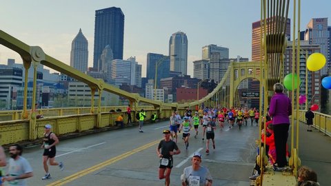 PITTSBURGH, PA - Circa May, 2015 - Participants race across the Andy Warhol Bridge at the 2015 DICK'S Sporting Goods Pittsburgh Marathon.