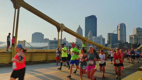 PITTSBURGH, PA - Circa May, 2015 - Participants race across the Andy Warhol Bridge at the 2015 DICK'S Sporting Goods Pittsburgh Marathon.