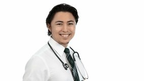 An attractive doctor wearing a white shirt with a stethoscope around his neck feeling great. Video on white background.