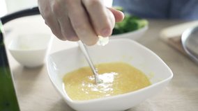 Man hand breaking egg in kitchen, slow motion shot at 240fps
 - Powered by Shutterstock - Get 15% off with code: PIKWIZARD15