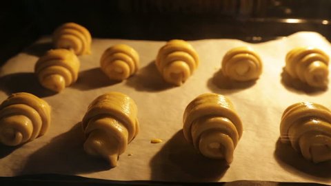 Time-lapse video of croissants baking in oven