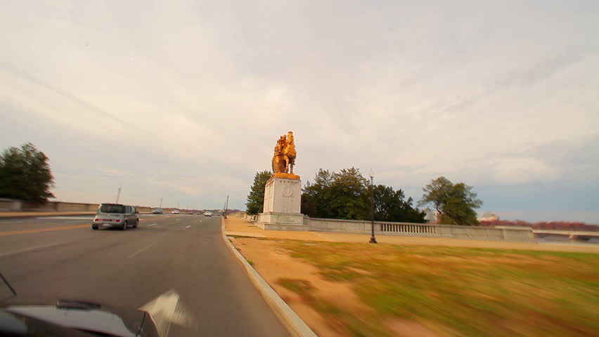 Washington, DC/United States - November 2012: A panning shot of a statue of a horse by the National Treasury building.