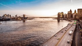 Timelapse transition from sunset to dusk with Brooklyn Bridge, boats sailing East River and FDR drive traffic(4k). For the ProRes 1.2GB HD version check clip ID 9724103