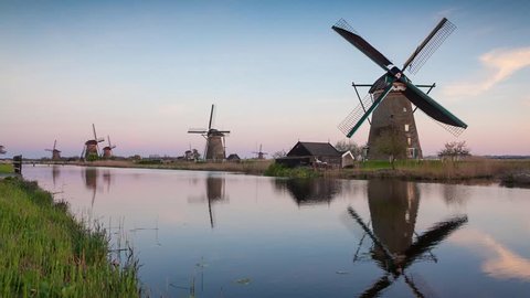 Famous Kinderdijk mills on the water channel. Netherlands, Europe. Unesco world heritage site. Exported from RAW file.