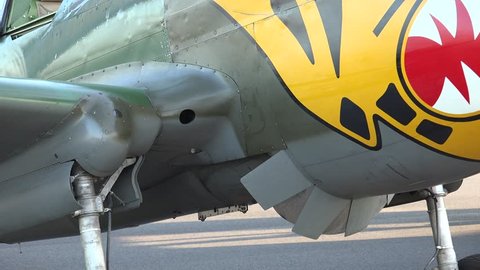 LAKELAND, FLORIDA, USA-CIRCA 2015: Curtis P-40 "Flying Tiger" parked showing highly feared nose art.