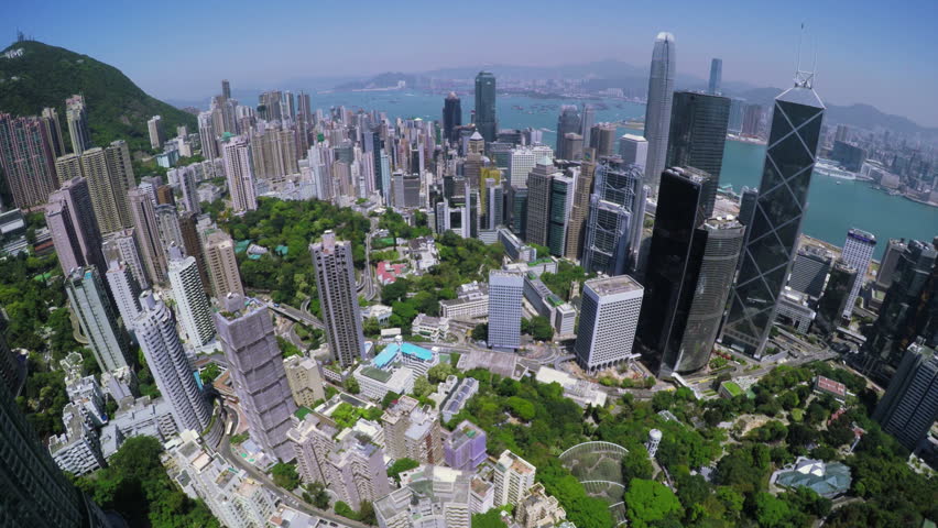Hong Kong City Aerial. Beautiful Clear Blue Sky.
4K Aerial view capturing the general Hong Kong Island. Tight aerial forward shot flying over office buildings and skyscrapers.

