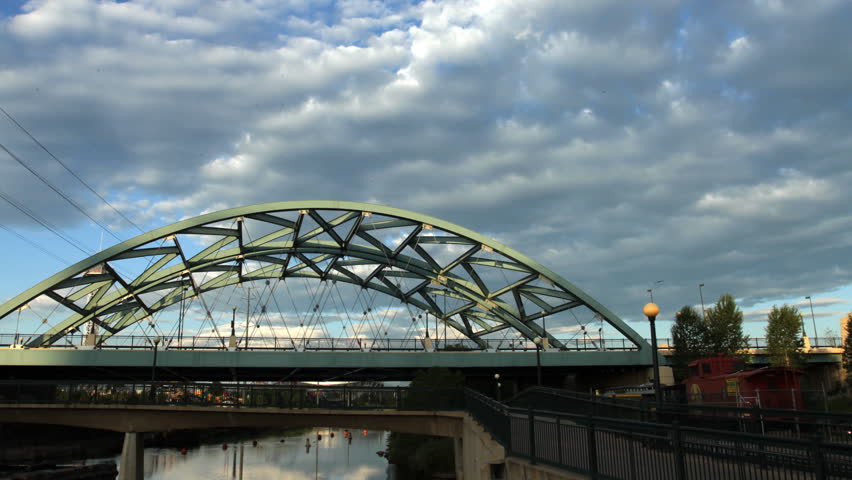 Morning Clouds over Bridge in Confluence Park in the heart of Denver. HD 1080p