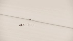 Video footage of a SUV on the salt flat Salar de Uyuni in the Andes of Bolivia
