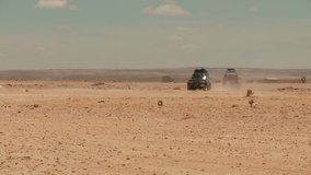 Video footage of a SUV in the desert of Bolivia