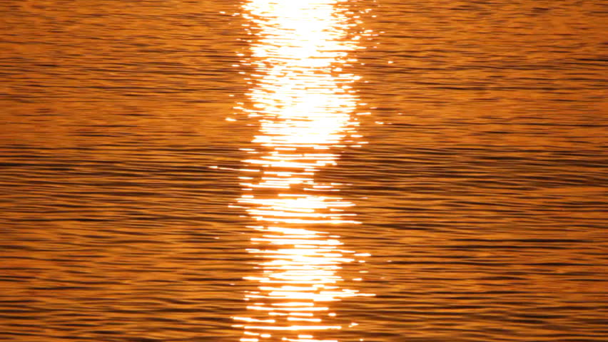 reflection of sunrise over the sea