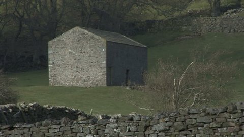 Zoom out from a field barn near Reeth, Swaledale, Richmondshire.