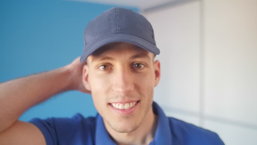 person wearing baseball cap