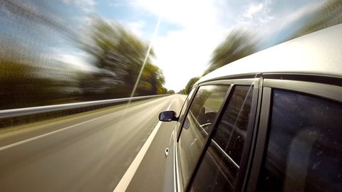 Driving a car. The camera is left outside. Timelapse.