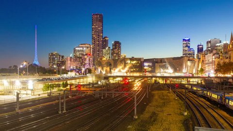4k motion timelapes video, hyperlapse, of trains arriving and departing from a railyway station in Melbourne, Australia