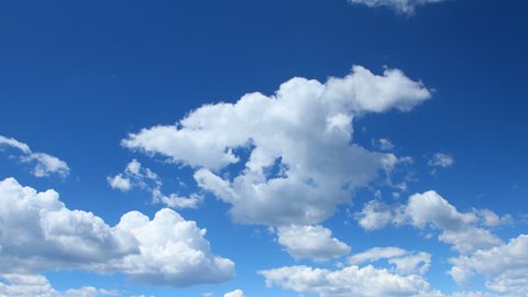 Summer Clouds fly across a royal blue sky. HD 1080p timelapse.