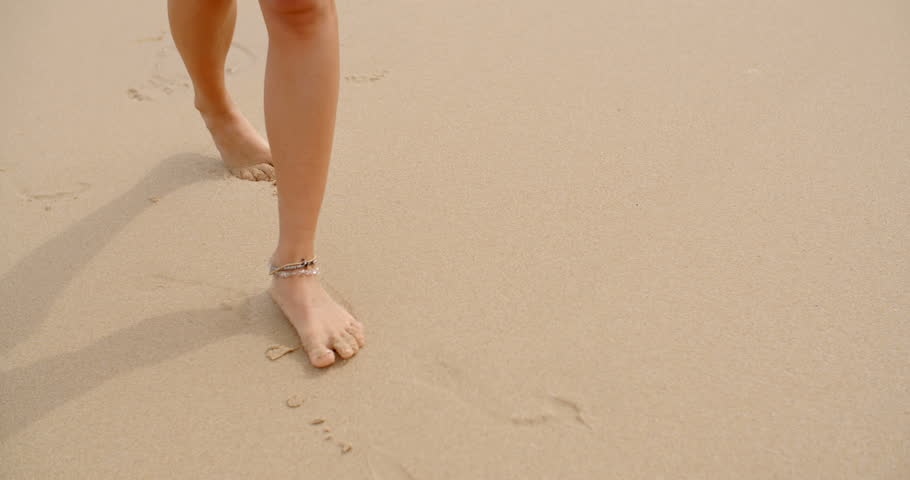 Woman Wearing Ankle Bracelet Walking 