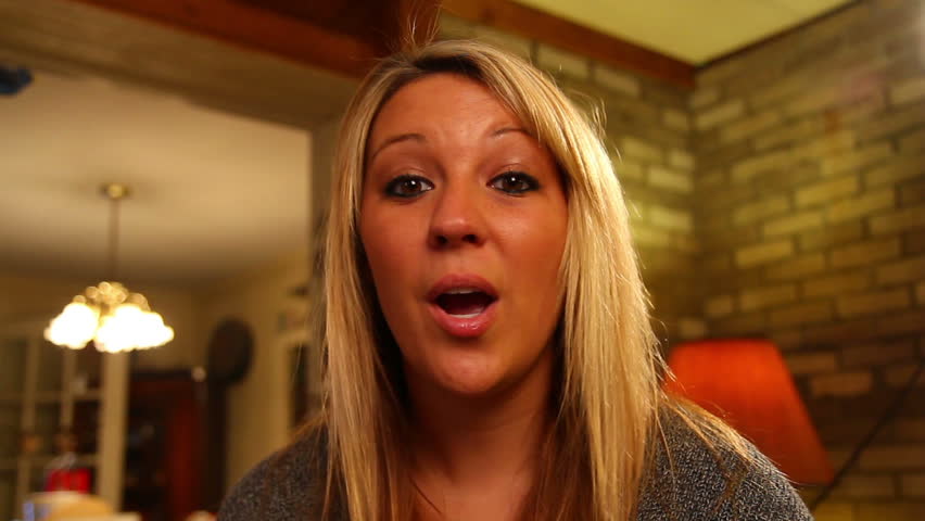 A young woman talks directly to camera.  Great for use on a screen for a video