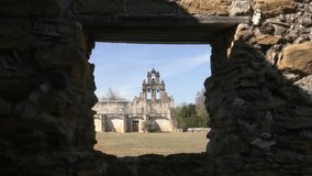 Video zoom in through ruins window of the old Spanish Mission San Juan Capistrano in San Antonio, Texas. Built in early 1700s 