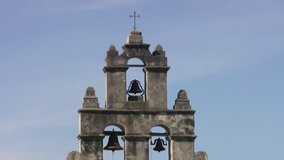 Video zoom out through stone window of the old Spanish Mission San Juan Capistrano in San Antonio, Texas. Built in early 1700â€™s