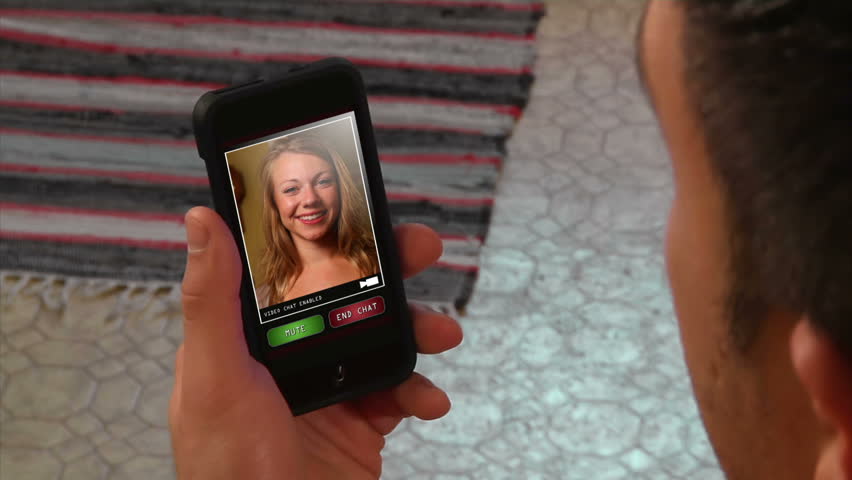 Female video chatting on a generic, portable handheld device.  Screen images