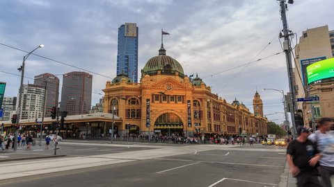 MELBOURNE, AUSTRALIA - MAR 14: 4K Day to Night timelapse video of Flinders street station on Mar 14, 2015 in Melbourne. It is the busiest station on Melbourne's metropolitan network.