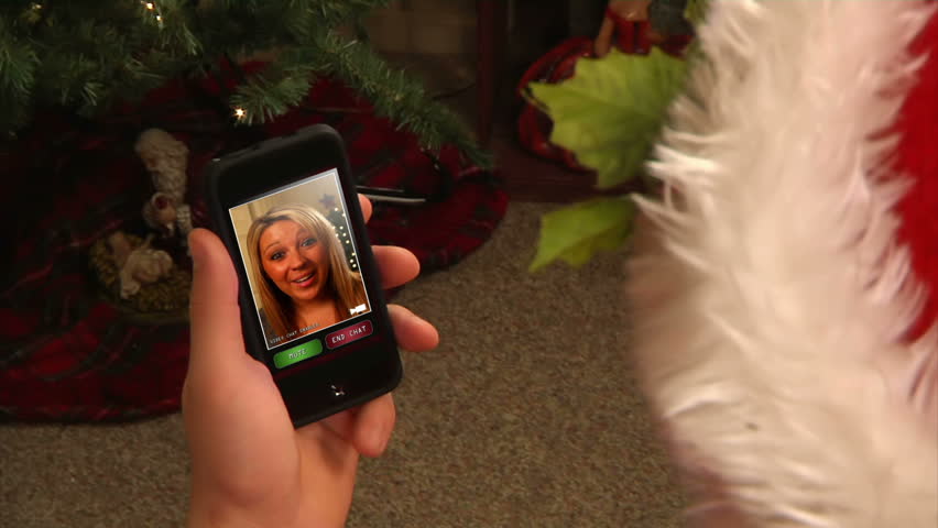 Video chatting on a generic, portable handheld device.  Screen images simulated.
