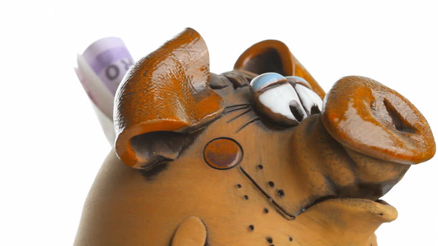 piggy bank with euro banknotes